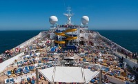 Cruise pool scene crowded with travelers